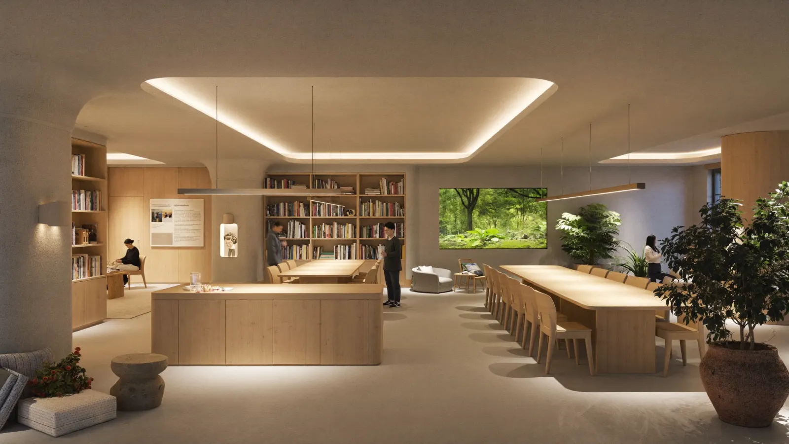 A calm underground common room with warm cove lighting, oak dining tables, bookshelves, plants and a screen showing a forest